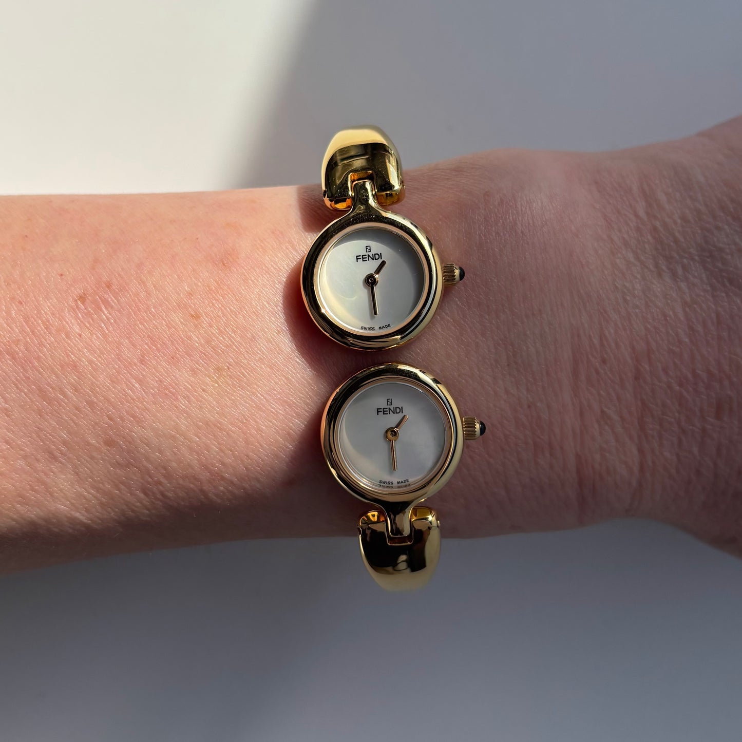Fendi 1990s Seashell Dial Two Time Zone Gold Plated Bangle Watch