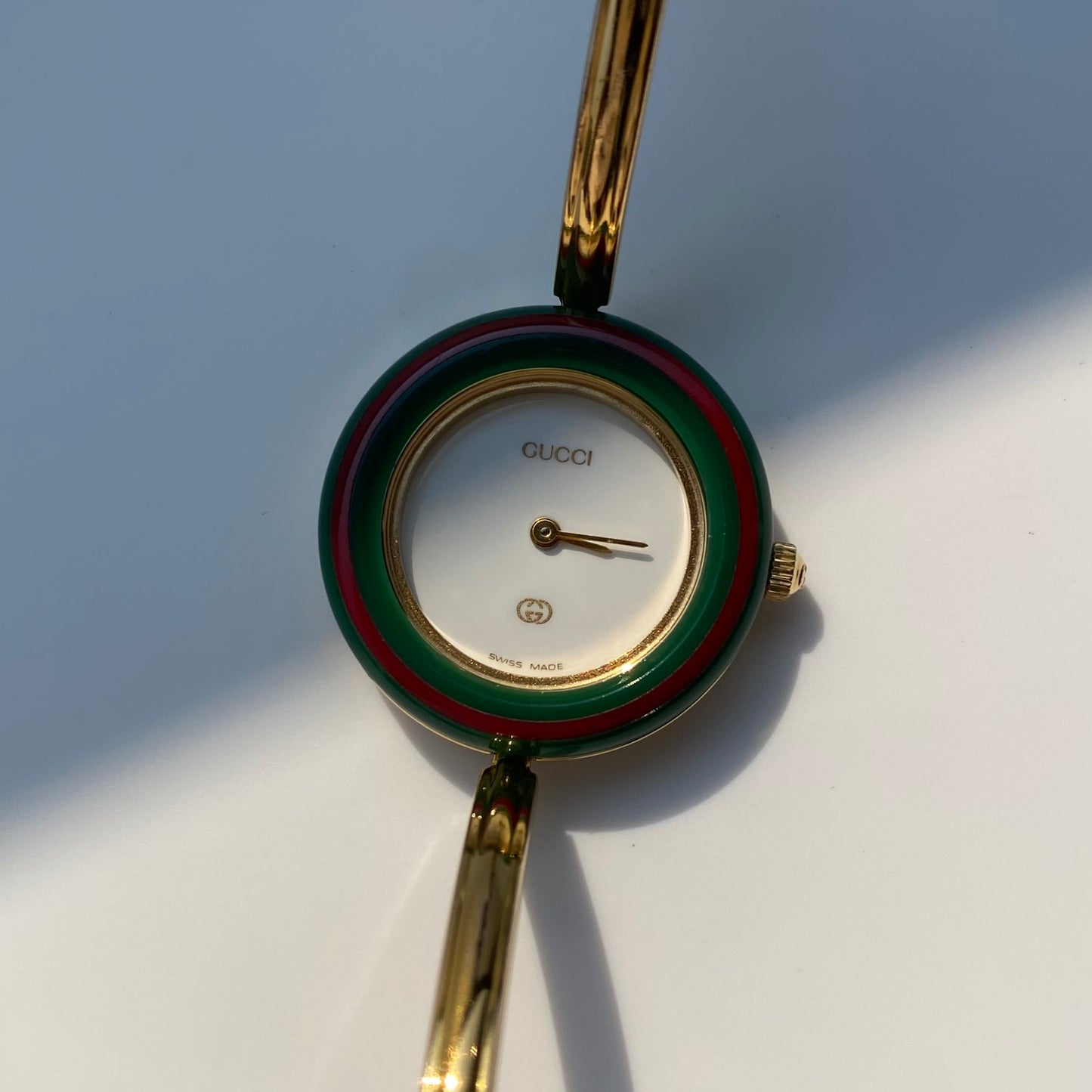 Gucci 1990s Interchangeable Bezel Gold Plated Bangle Watch with 12 bezels, case