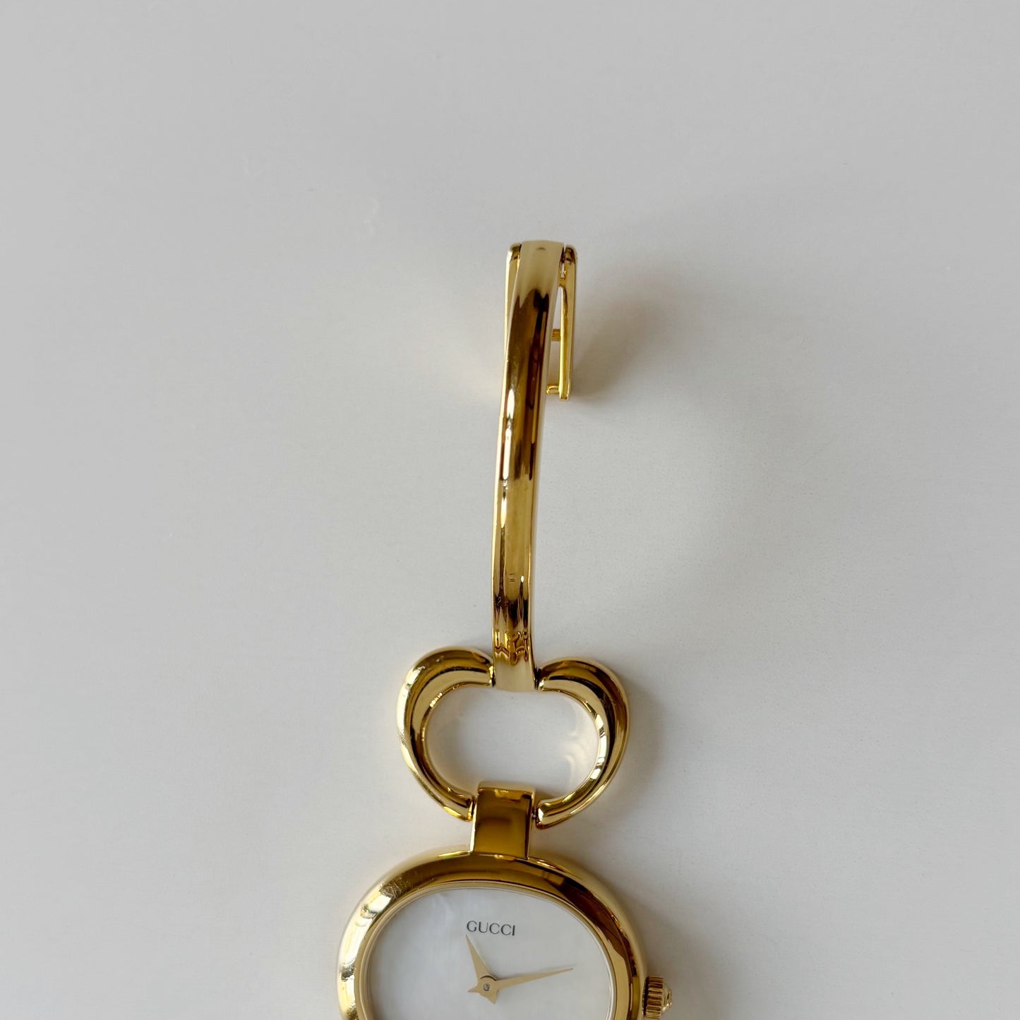 Gucci 1990s Seashell Oval Dial Gold Plated Bangle Watch (Small)