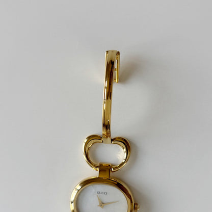 Gucci 1990s Seashell Oval Dial Gold Plated Bangle Watch (Small)