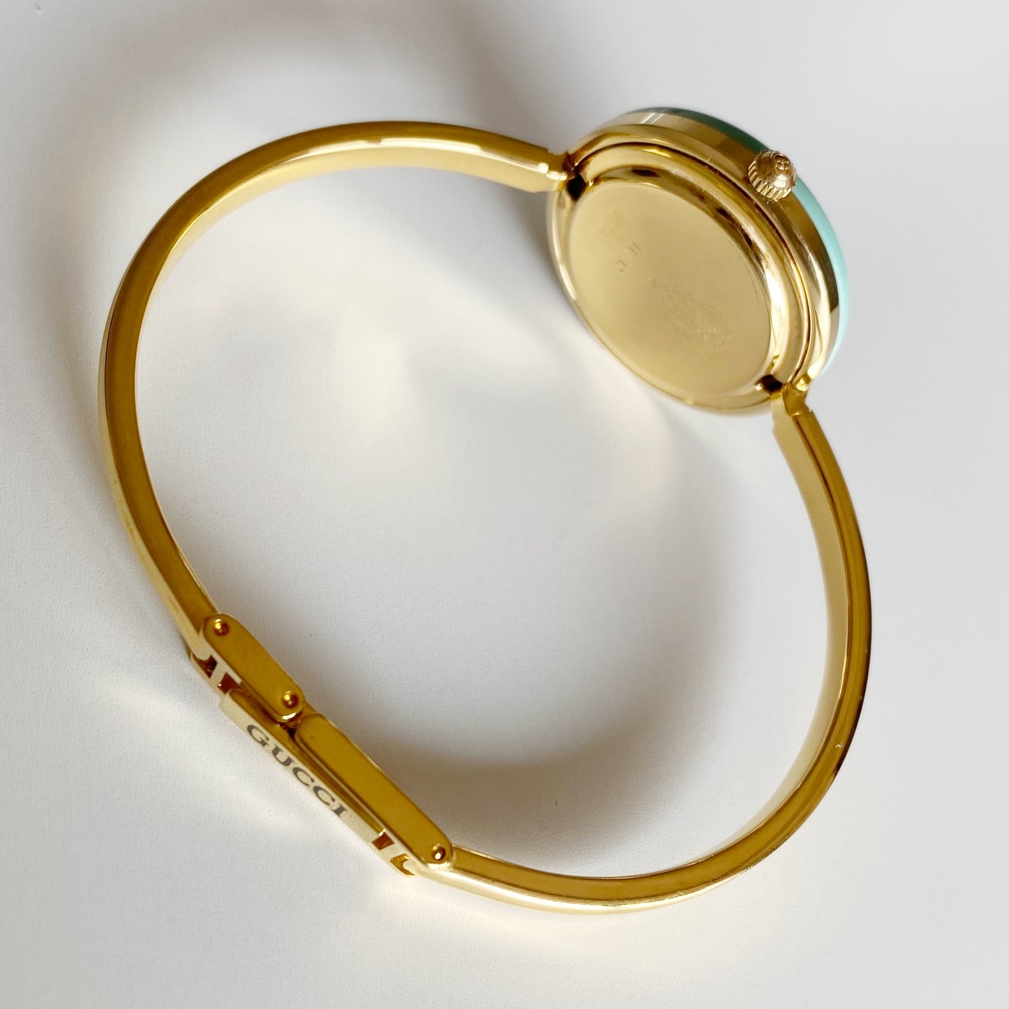 Gucci 1990s Interchangeable Bezel Gold Plated Bangle Watch with 12 bezels, case