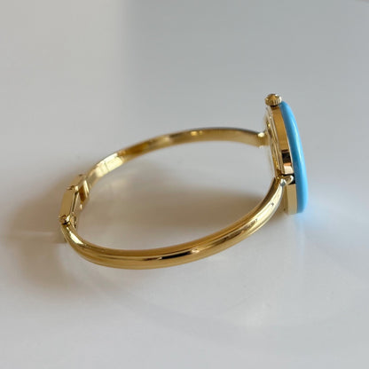 Gucci 1990s Interchangeable Bezel Gold Plated Bangle Watch with 12 bezels, case