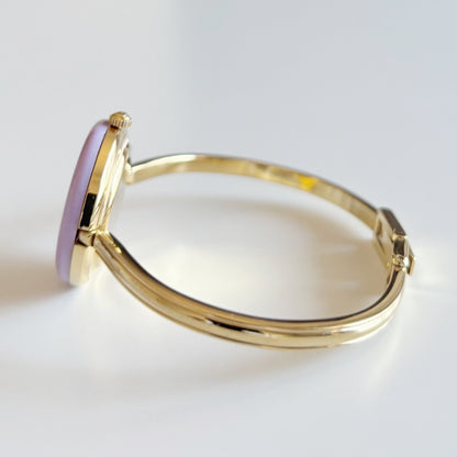 Gucci 1990s Interchangeable Bezel Gold Plated Bangle Watch with 12 bezels, case