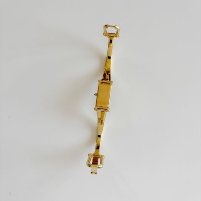Gucci 1990s Black Dial Gold Plated Bangle Watch