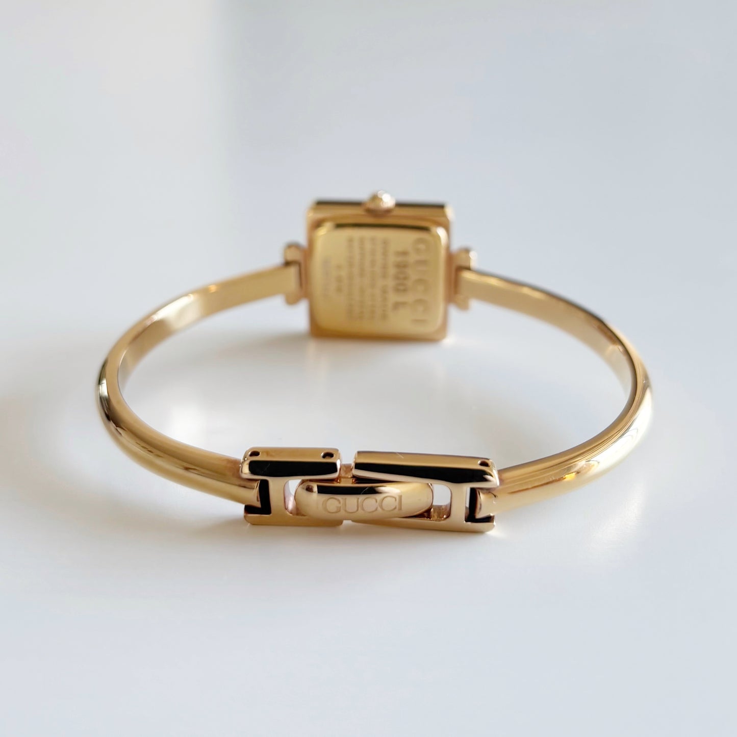 Gucci 1990s Seashell Square Dial Gold Plated Bangle Watch