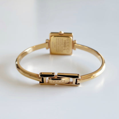 Gucci 1990s Seashell Square Dial Gold Plated Bangle Watch