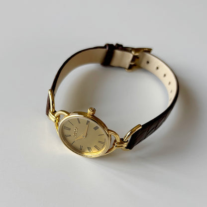 Gucci 1990s Gold Round Dial Horsebit Gold Plated Watch