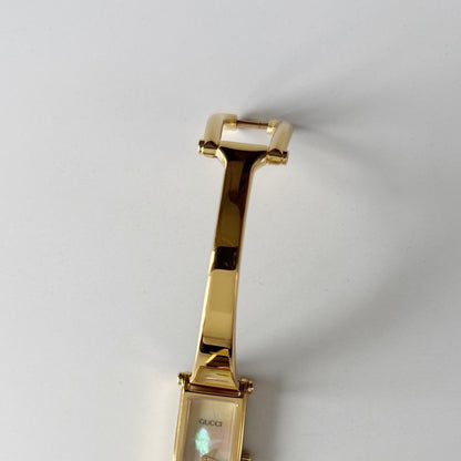 Gucci 1990s Seashell Rectangular Dial Gold Plated Bangle Watch