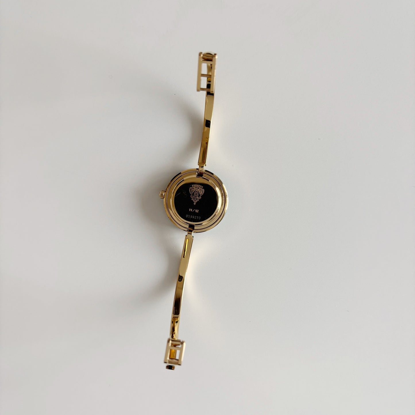 Gucci 1990s Interchangeable Bezel Gold Plated Bangle Watch with 12 bezels, case