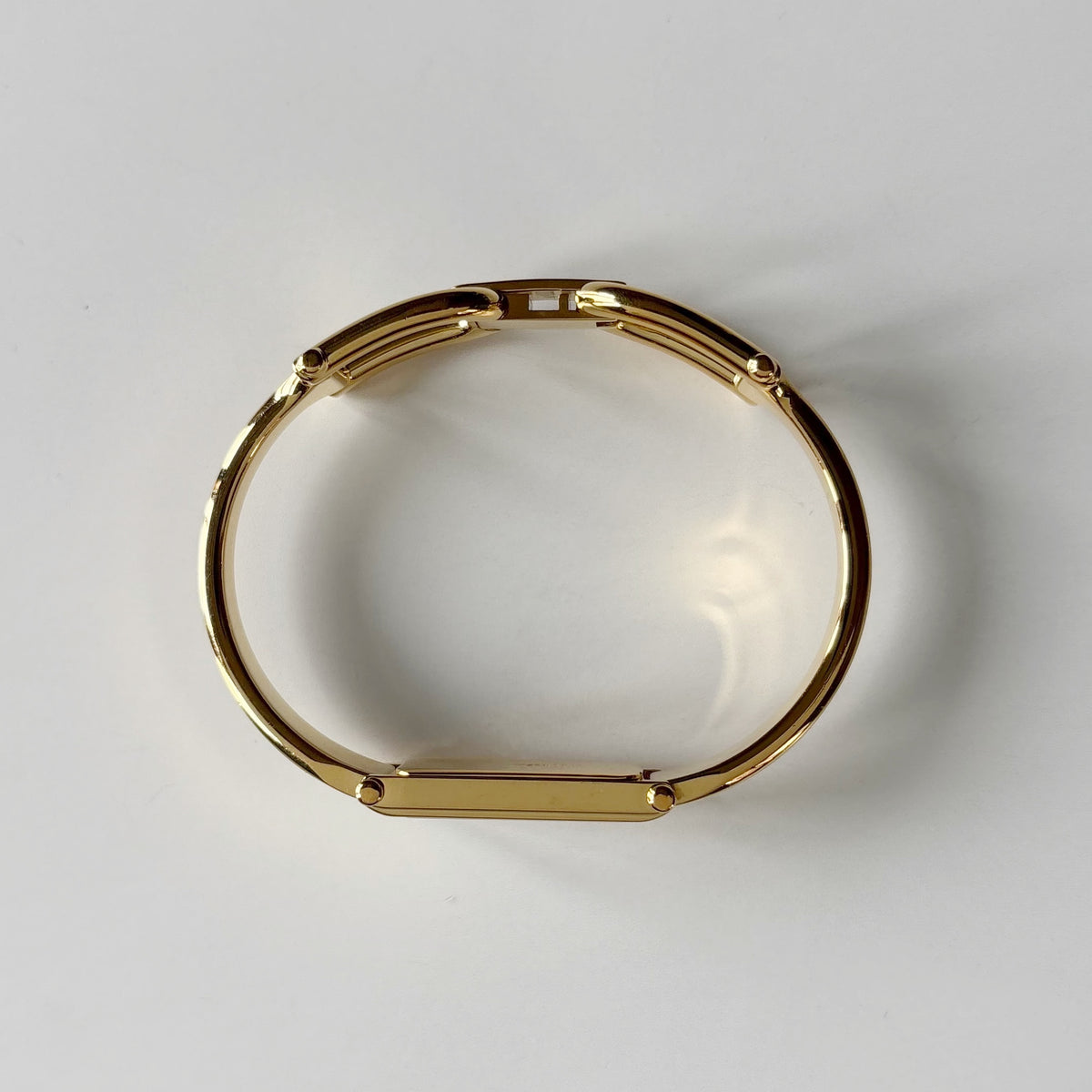 Gucci 1990s Seashell Rectangular Dial Gold Plated Bangle Watch