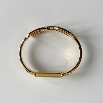 Gucci 1990s Seashell Rectangular Dial Gold Plated Bangle Watch