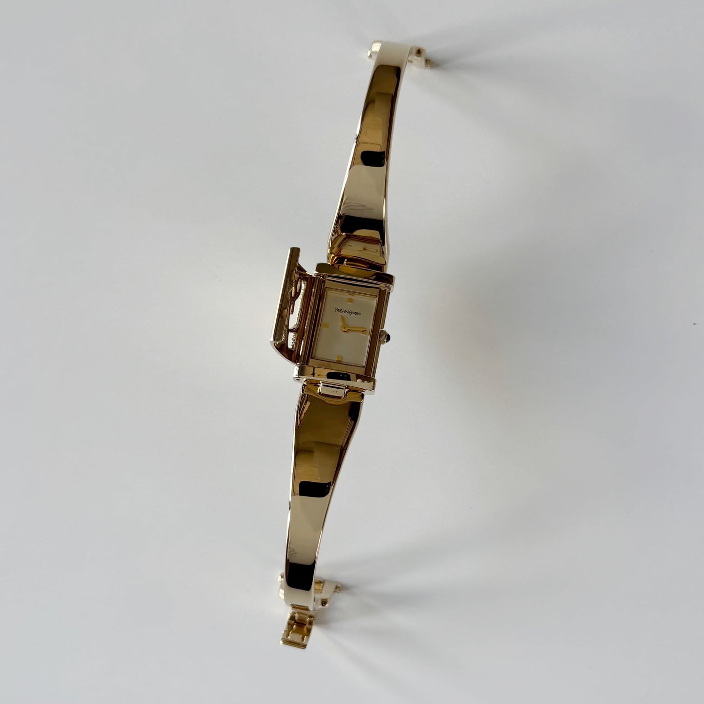 Yves Saint Laurent 1990s Peek-A-Boo Gold Plated Bangle Watch