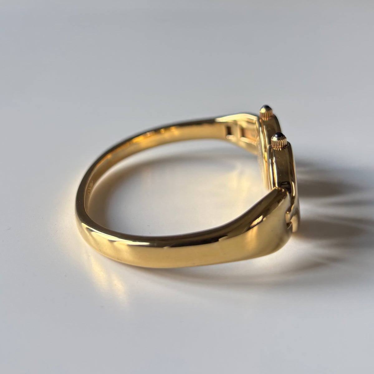 Fendi 1990s Seashell Dial Two Time Zone Gold Plated Bangle Watch