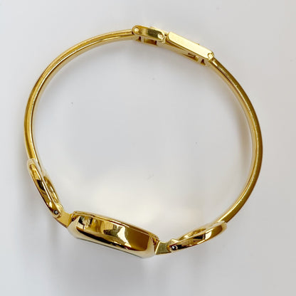 Gucci 1990s Seashell Dial Oval Gold Plated Bangle Watch