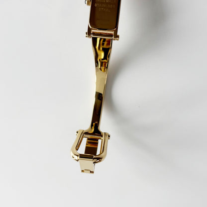 Gucci 1990s Seashell Rectangular Dial Gold Plated Bangle Watch