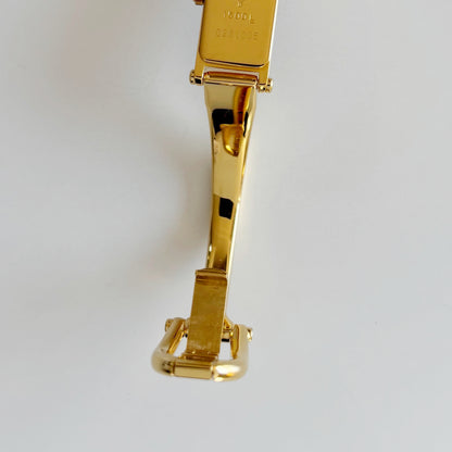 Gucci 1990s Black Rectangular Dial Gold Plated Bangle Watch