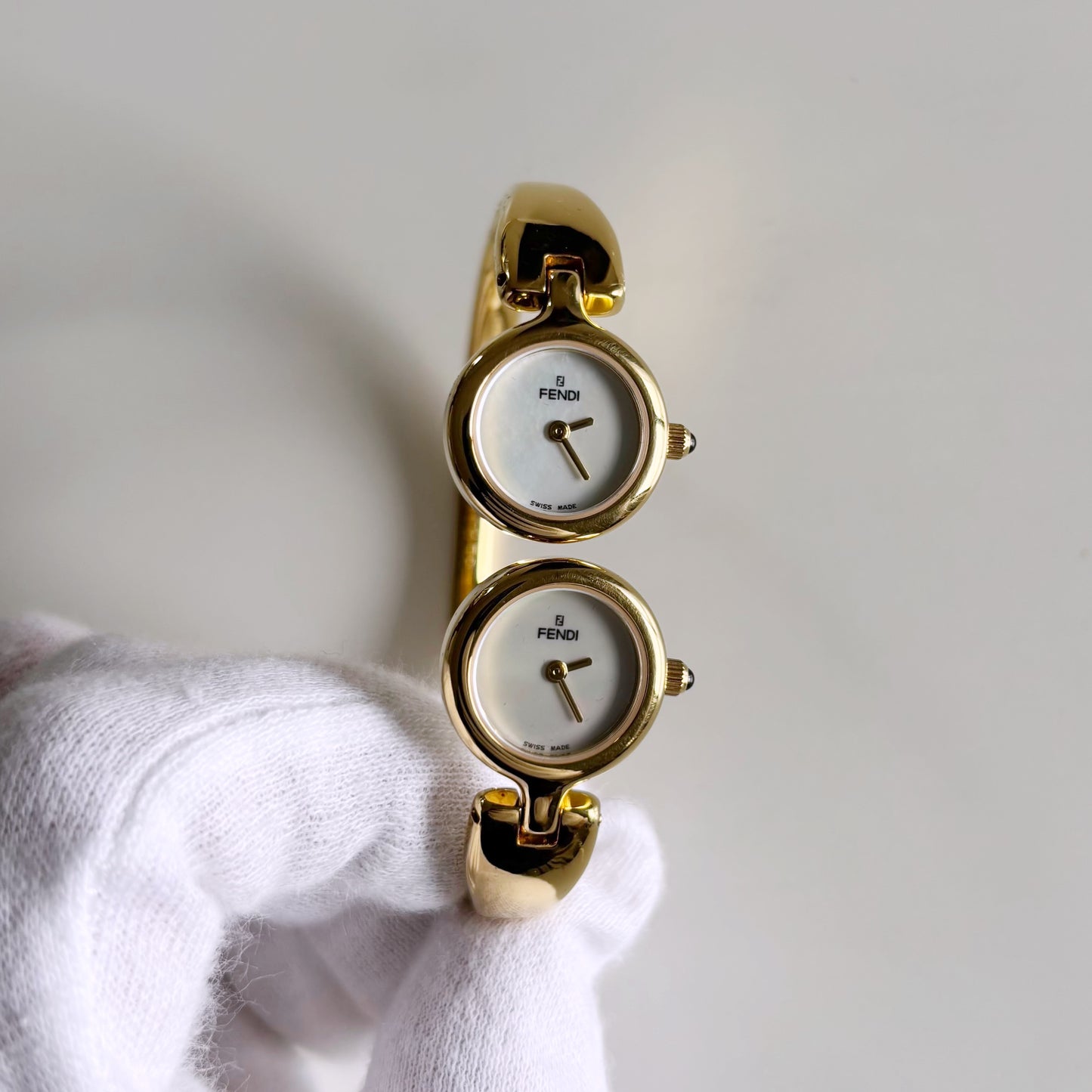 Fendi 1990s Seashell Dial Two Time Zone Gold Plated Bangle Watch