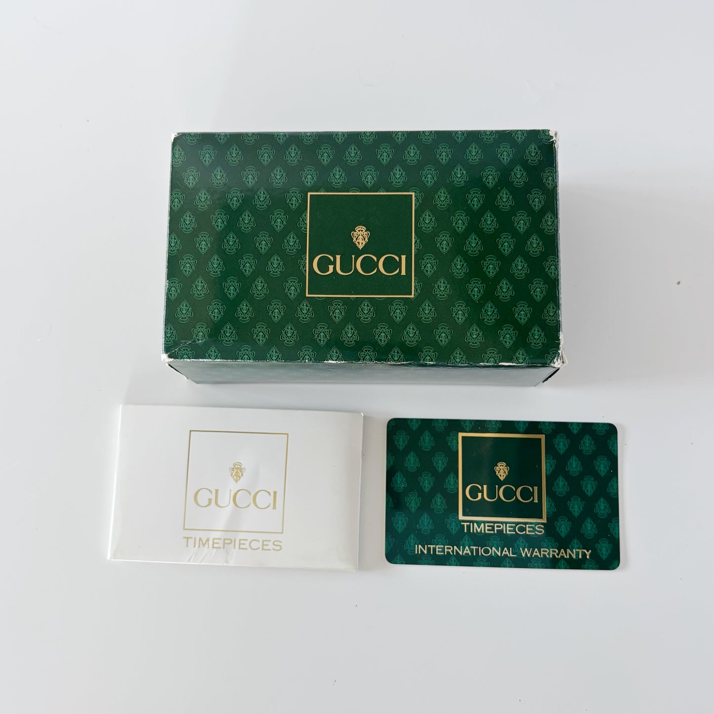 Gucci 1990s Interchangeable Bezel Gold Plated Bangle Watch with 12 bezels, case