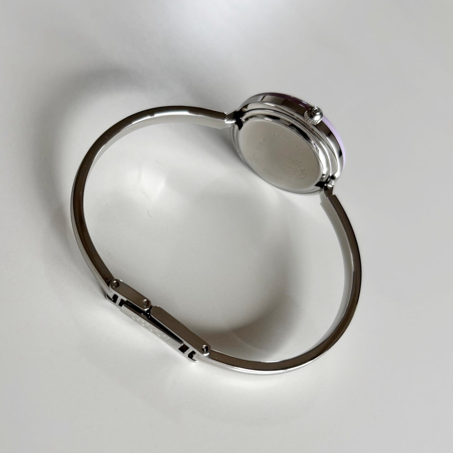 Gucci 1990s Interchangeable Bezel Stainless Steel Bangle Watch with 12 bezels, case