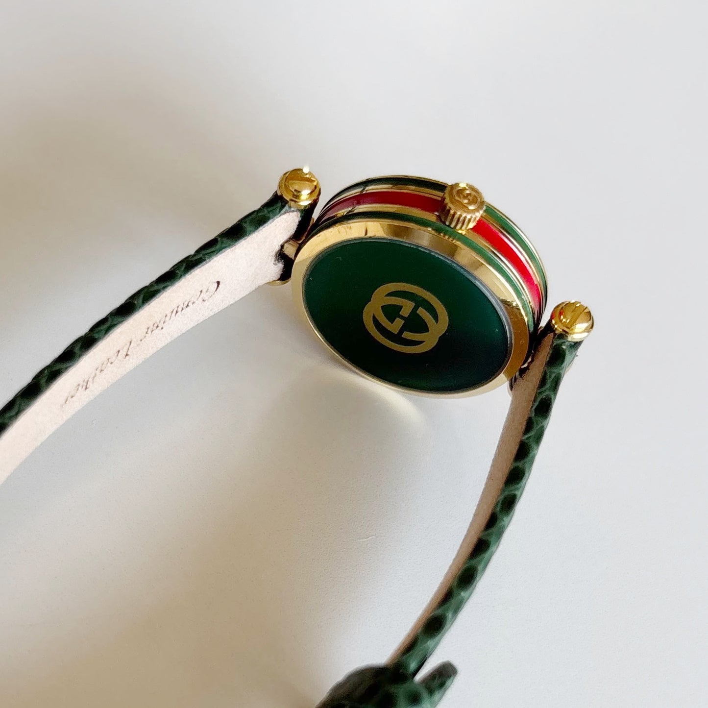 Gucci 1990s Round Dial Green Gold Plated Watch