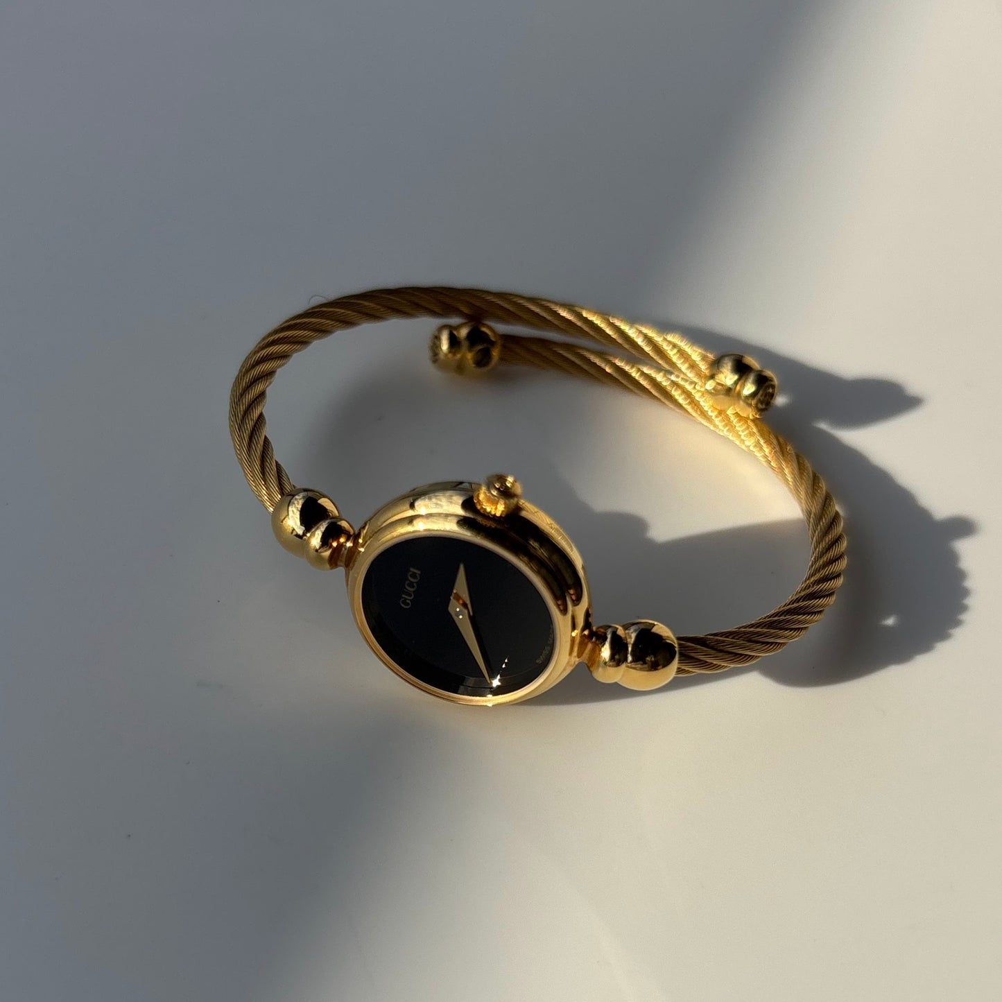 Gucci 1990s Black Dial Gold Plated Cable Bangle Watch