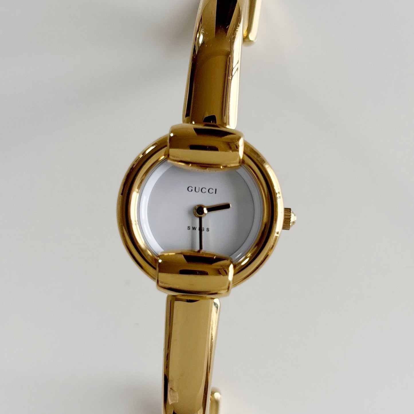 Gucci 1990s Round Dial Gold Plated Bangle Watch (Small)