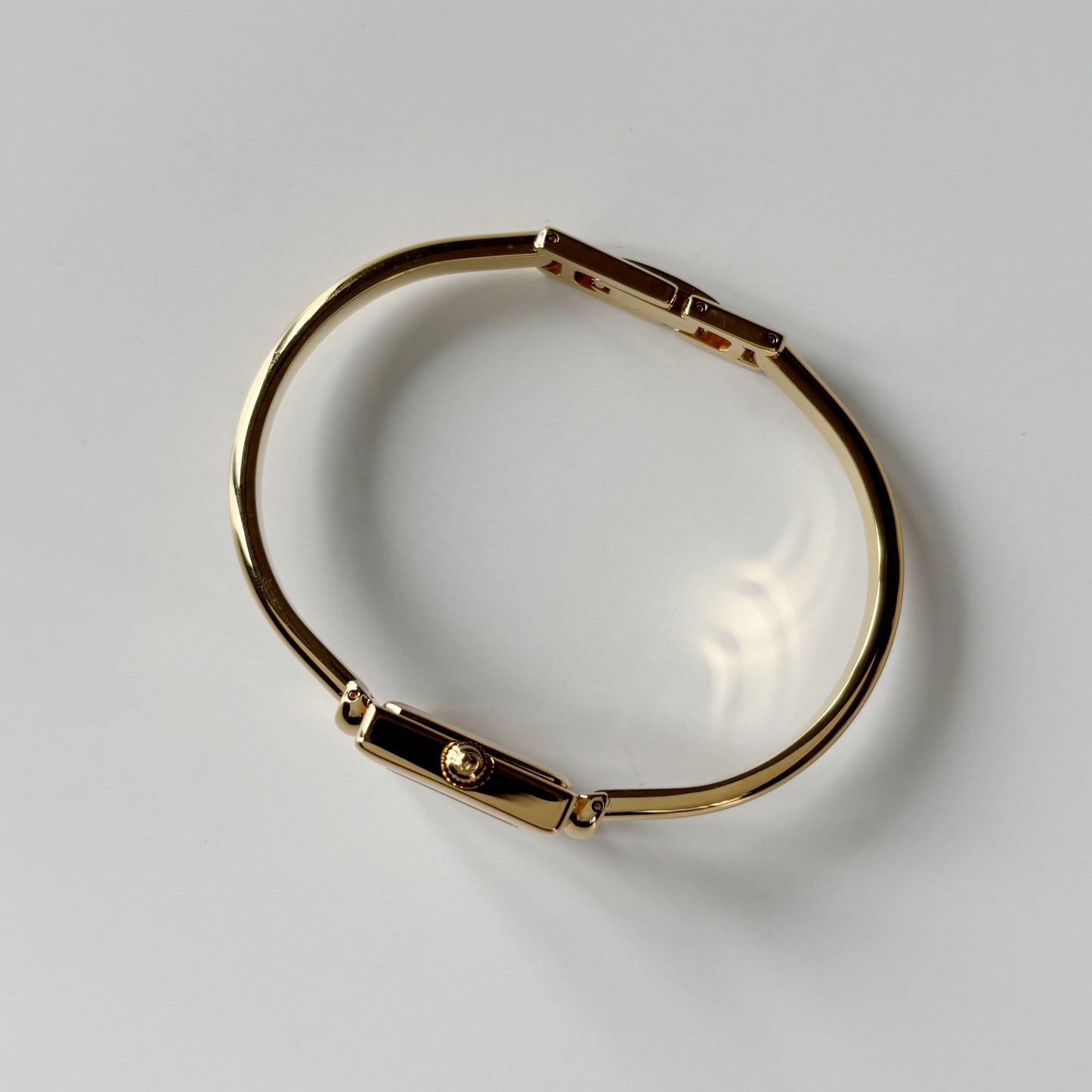 Gucci 1990s Square Dial Gold Plated Bangle Watch