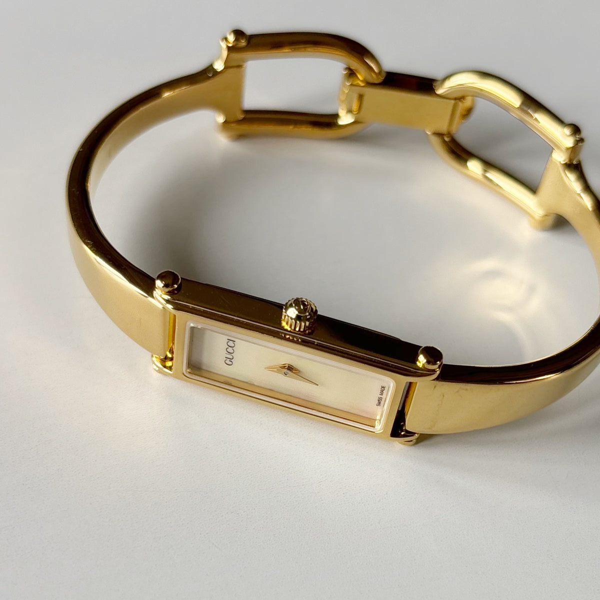 Gucci 1990s Seashell Rectangular Dial Gold Plated Bangle Watch