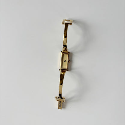 Gucci 1990s Gold Rectangular Dial Gold Plated Bangle Watch