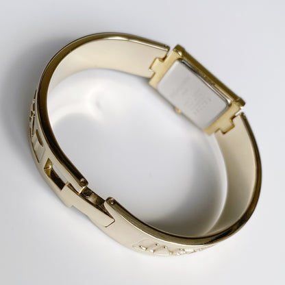 Yves Saint Laurent 1990s Seashell Dial Gold Plated Bangle Watch