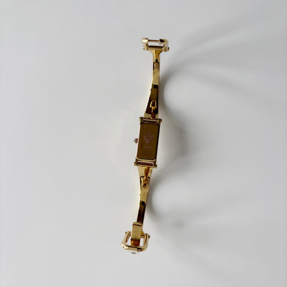 Gucci 1990s Gold Rectangular Dial Gold Plated Bangle Watch