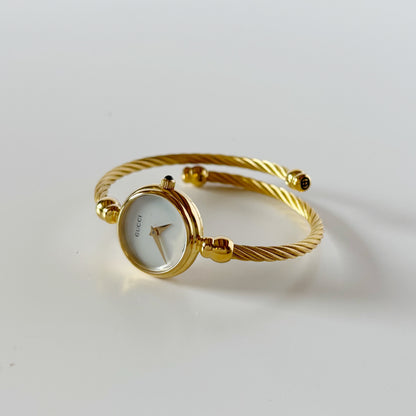 Gucci 1990s Seashell Dial Gold Plated Cable Bangle Watch