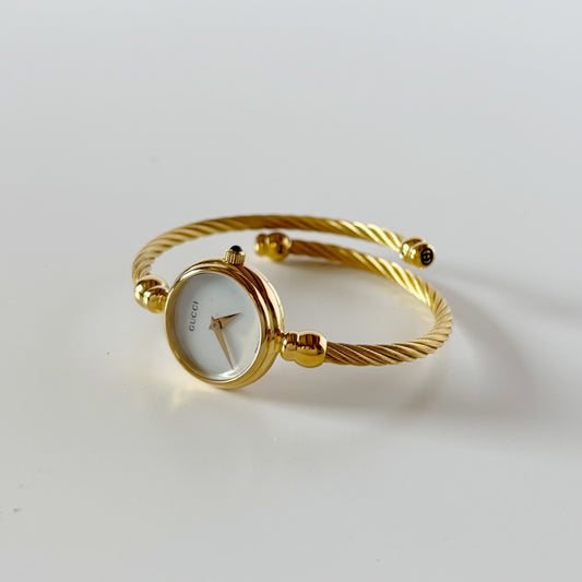 Gucci 1990s Seashell Dial Gold Plated Cable Bangle Watch