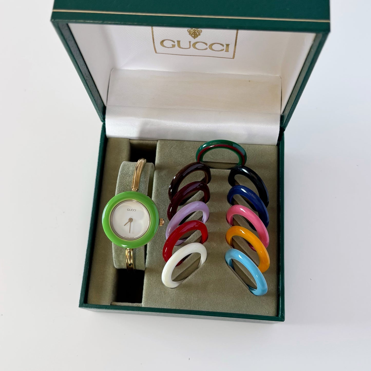 Gucci 1990s Interchangeable Bezel Gold Plated Bangle Watch with 12 bezels, case (Small)