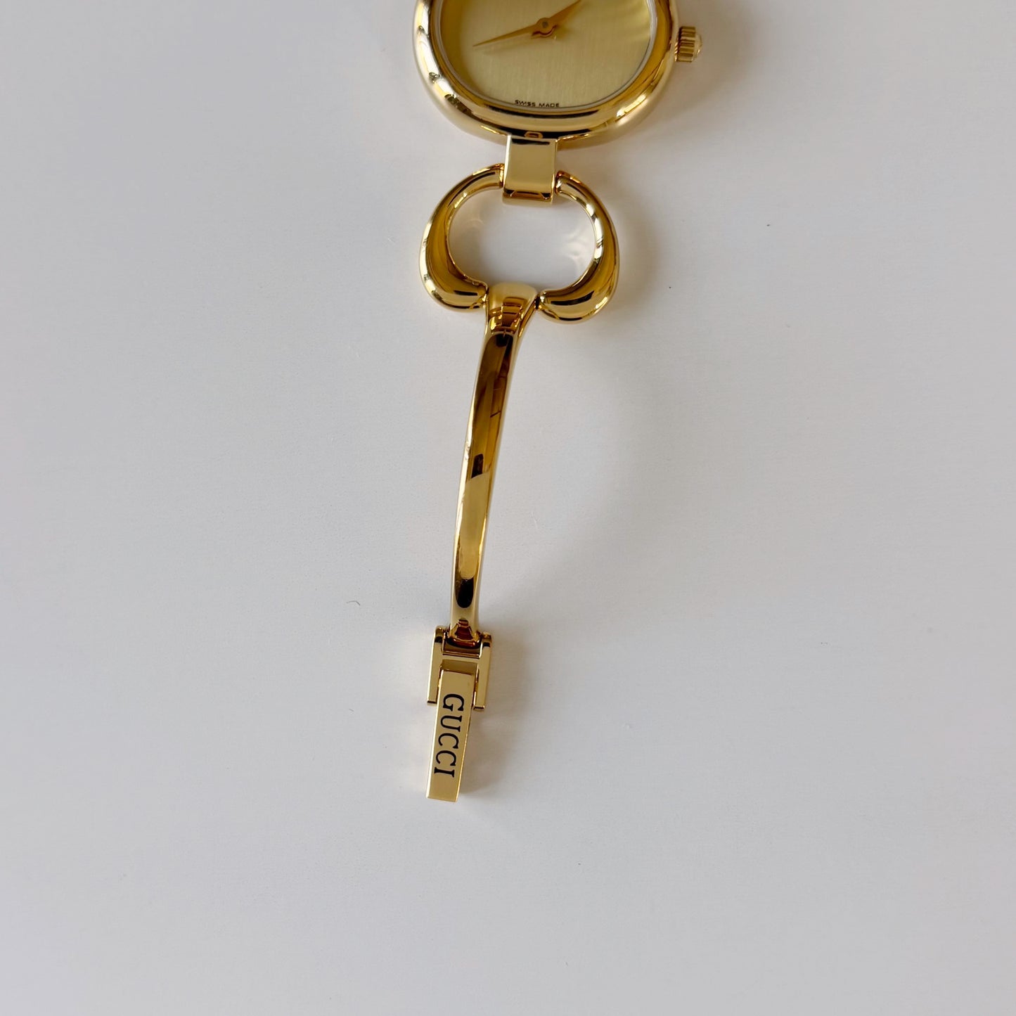 Gucci 1990s Oval Gold Dial Gold Plated Bangle Watch (Small)