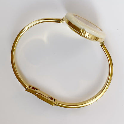 Gucci 1990s Interchangeable Bezel Gold Plated Bangle Watch with 12 bezels, case