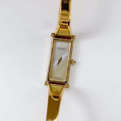 Gucci 1990s Rectangular Seashell Dial Gold Plated Bangle Watch