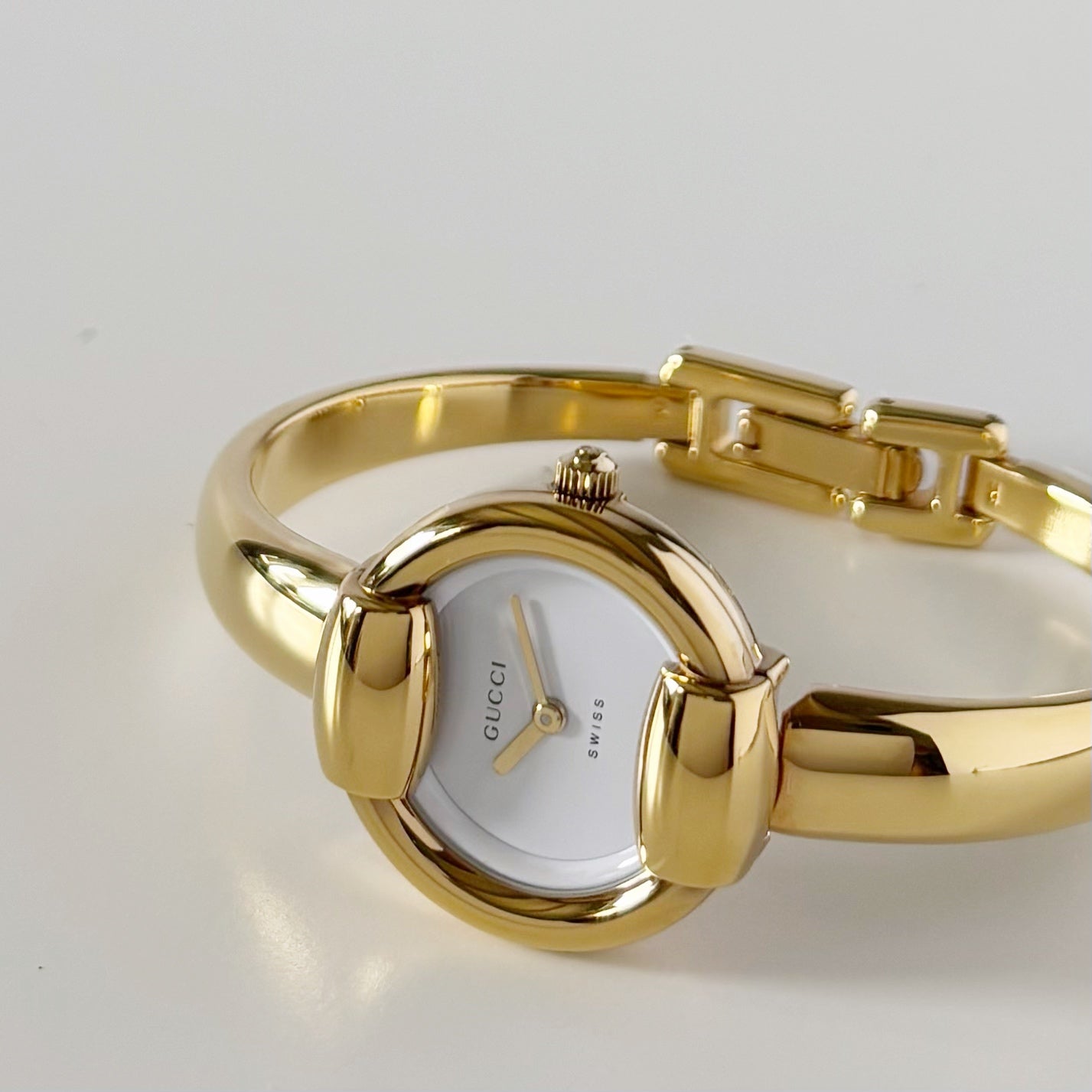 Gucci 1990s Round Dial Gold Plated Bangle Watch