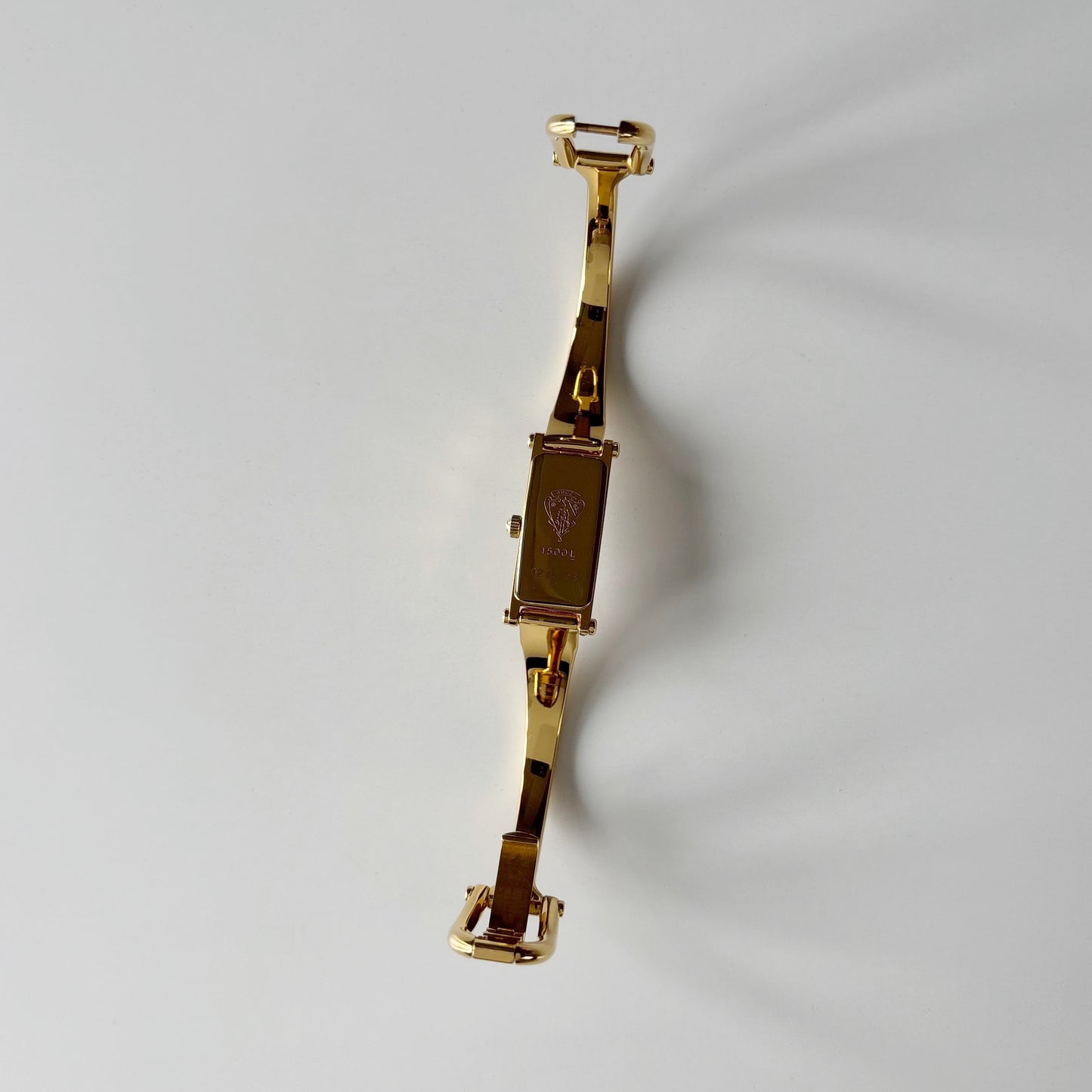 Gucci 1990s Seashell Rectangular Dial Gold Plated Bangle Watch