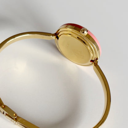Gucci 1990s Interchangeable Bezel Gold Plated Bangle Watch with 12 bezels, case