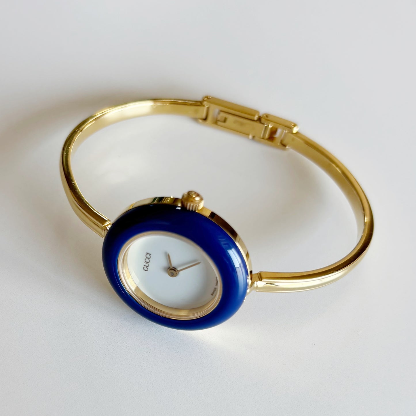 Gucci 1990s Interchangeable Bezel Gold Plated Bangle Watch with 12 bezels, case