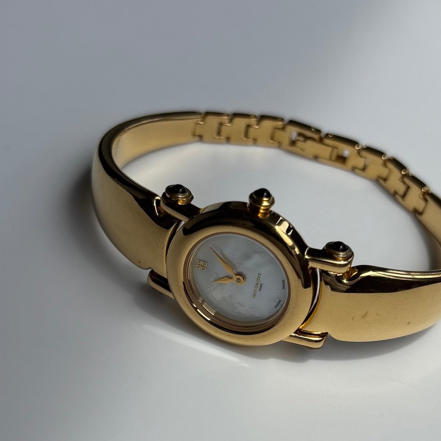 Givenchy 1990s Seashell Dial Gold Plated Bangle Watch