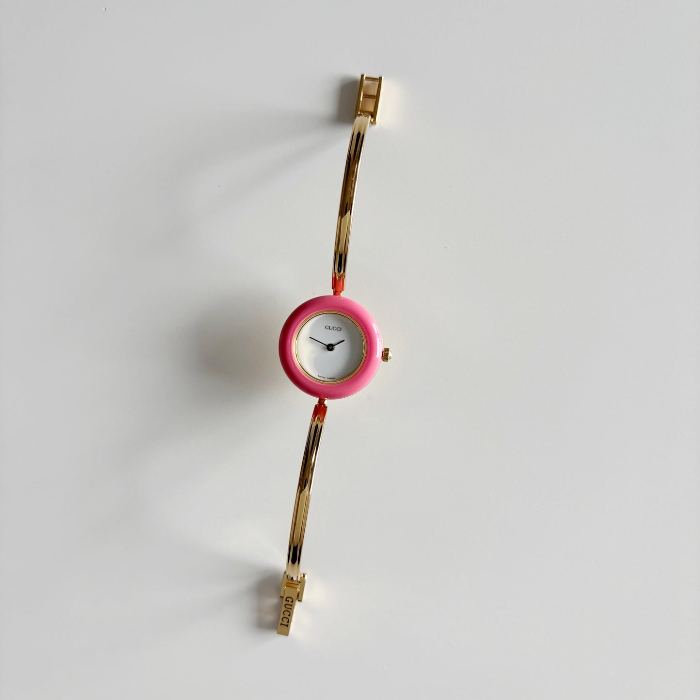 Gucci 1990s Interchangeable Bezel Gold Plated Bangle Watch with 12 bezels, case