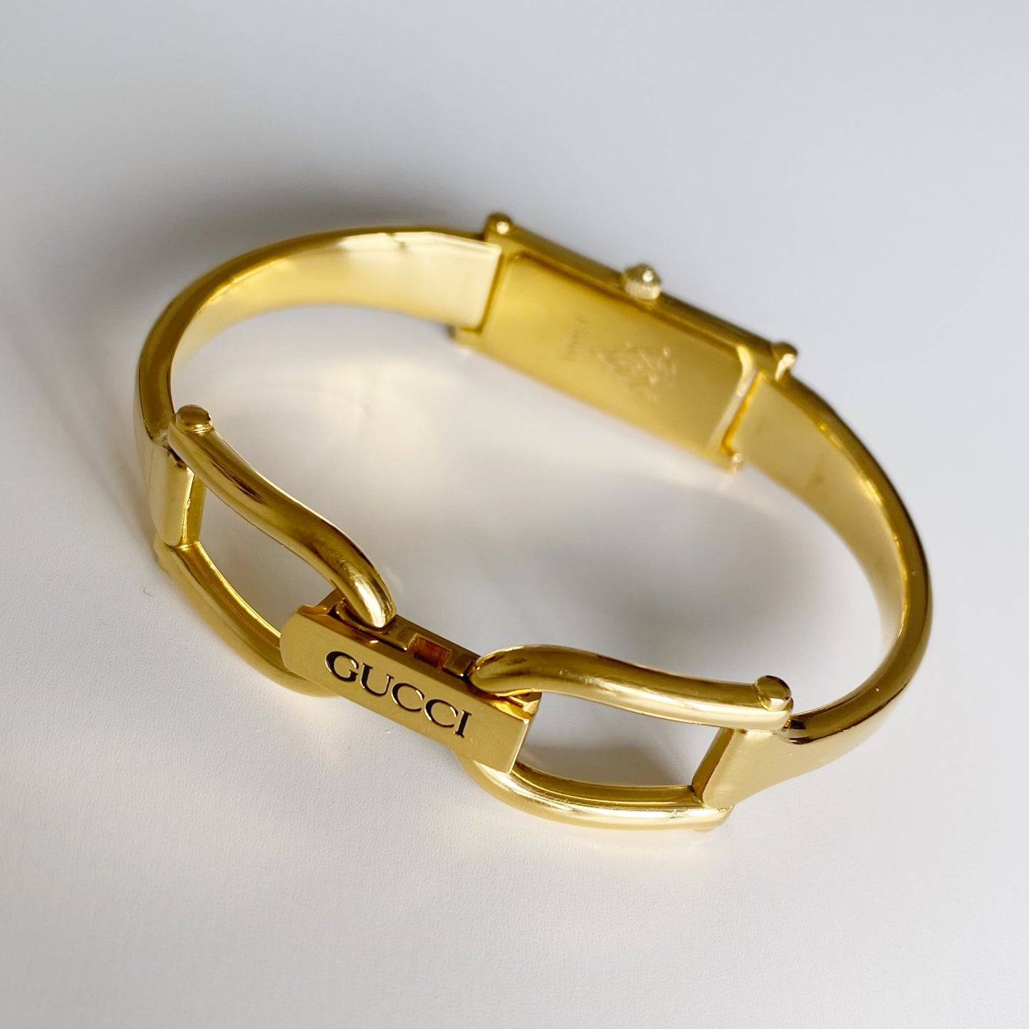 Gucci 1990s Gold Dial Rectangular  Gold Plated Bangle Watch