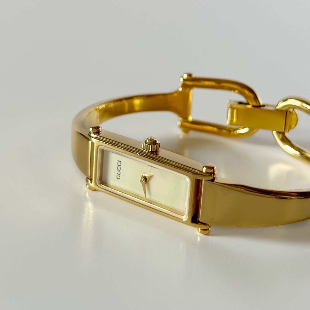 Gucci 1990s Seashell Rectangular Dial Gold Plated Bangle Watch