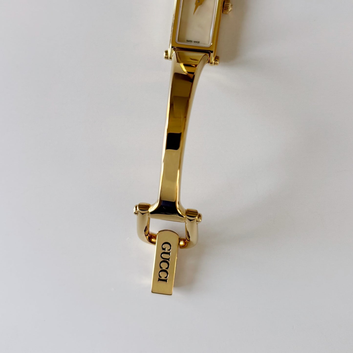 Gucci 1990s Seashell Rectangular Dial Gold Plated Bangle Watch