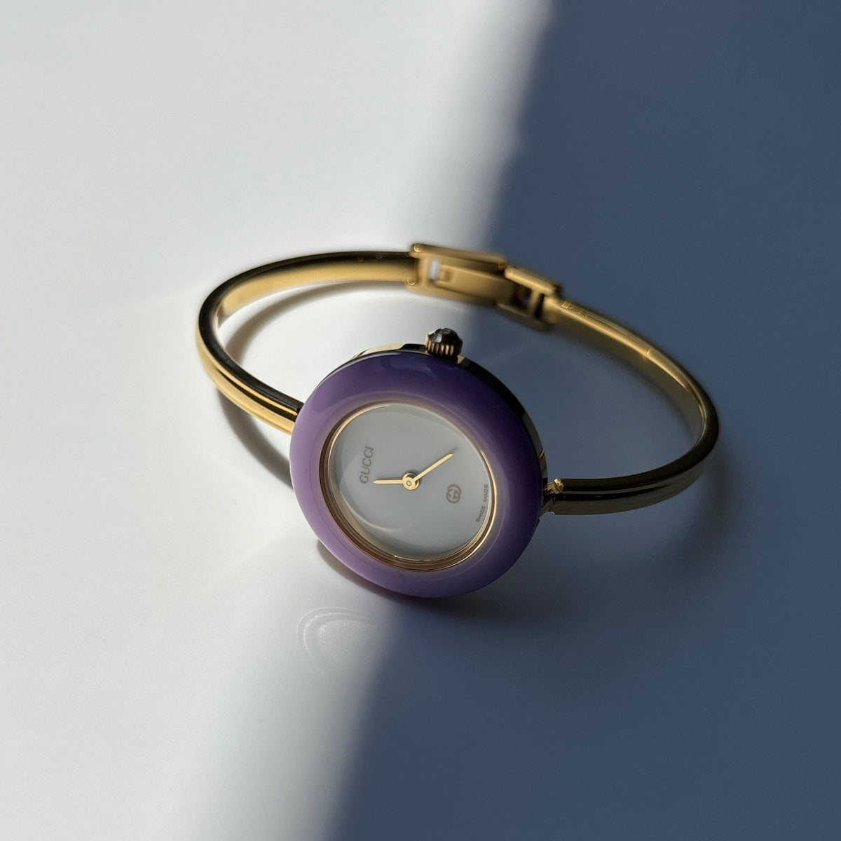 Gucci 1990s Interchangeable Bezel Gold Plated Bangle Watch with 12 bezels, case