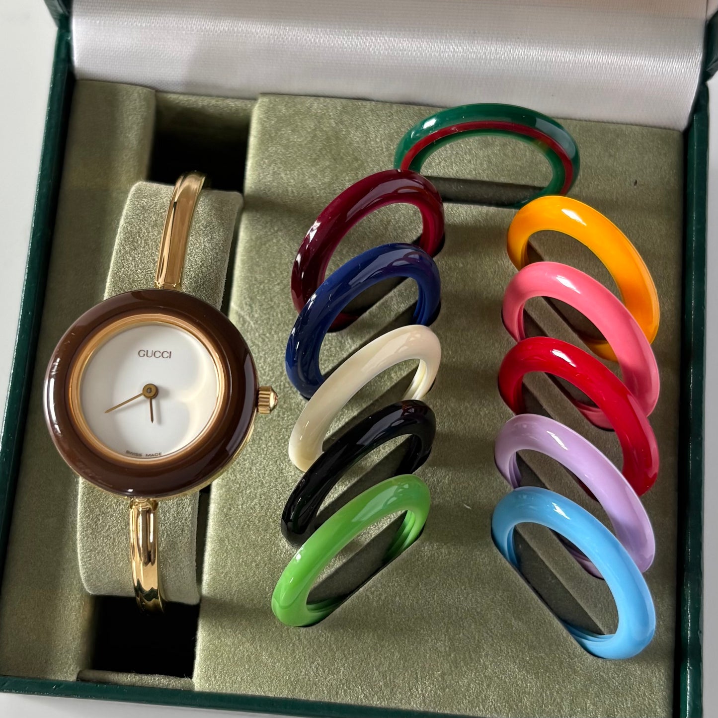 Gucci 1990s Interchangeable Bezel Gold Plated Bangle Watch with 12 bezels, case
