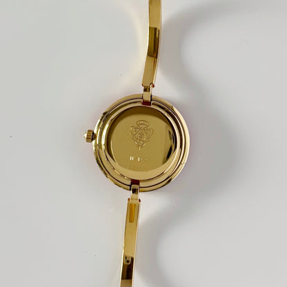 Gucci 1990s Interchangeable Bezel Gold Plated Bangle Watch with 12 bezels, case (Small)