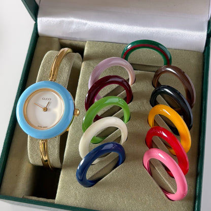Gucci 1990s Interchangeable Bezel Gold Plated Bangle Watch with 12 bezels, case
